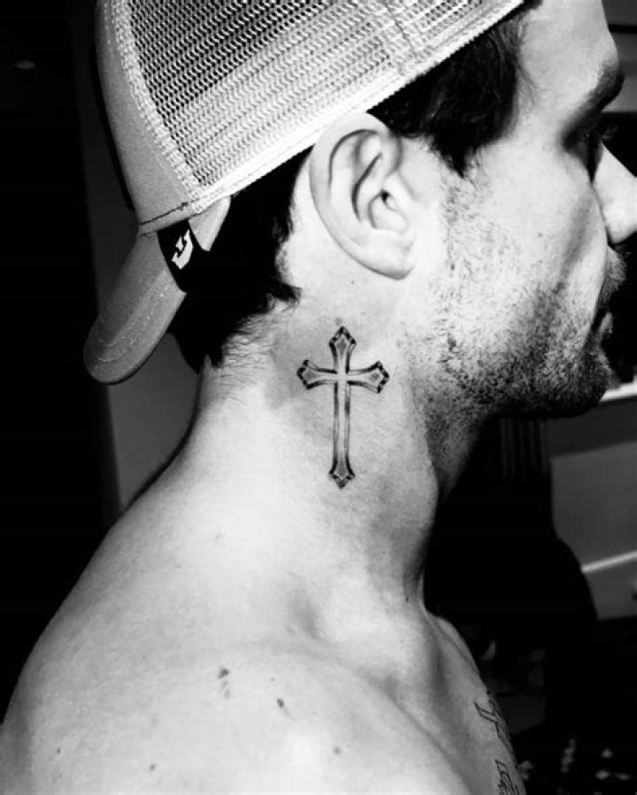 Liam Payne's Cross Tattoo: A Symbol of Faith and Resilience